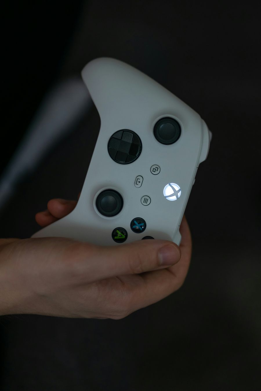 Close-up of DualSense face buttons